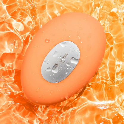 Кліторальний вібратор з підігрівом та охолодженням We-Vibe Temp Tangerine помаранчевий