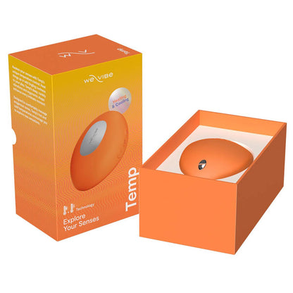 Кліторальний вібратор з підігрівом та охолодженням We-Vibe Temp Tangerine помаранчевий